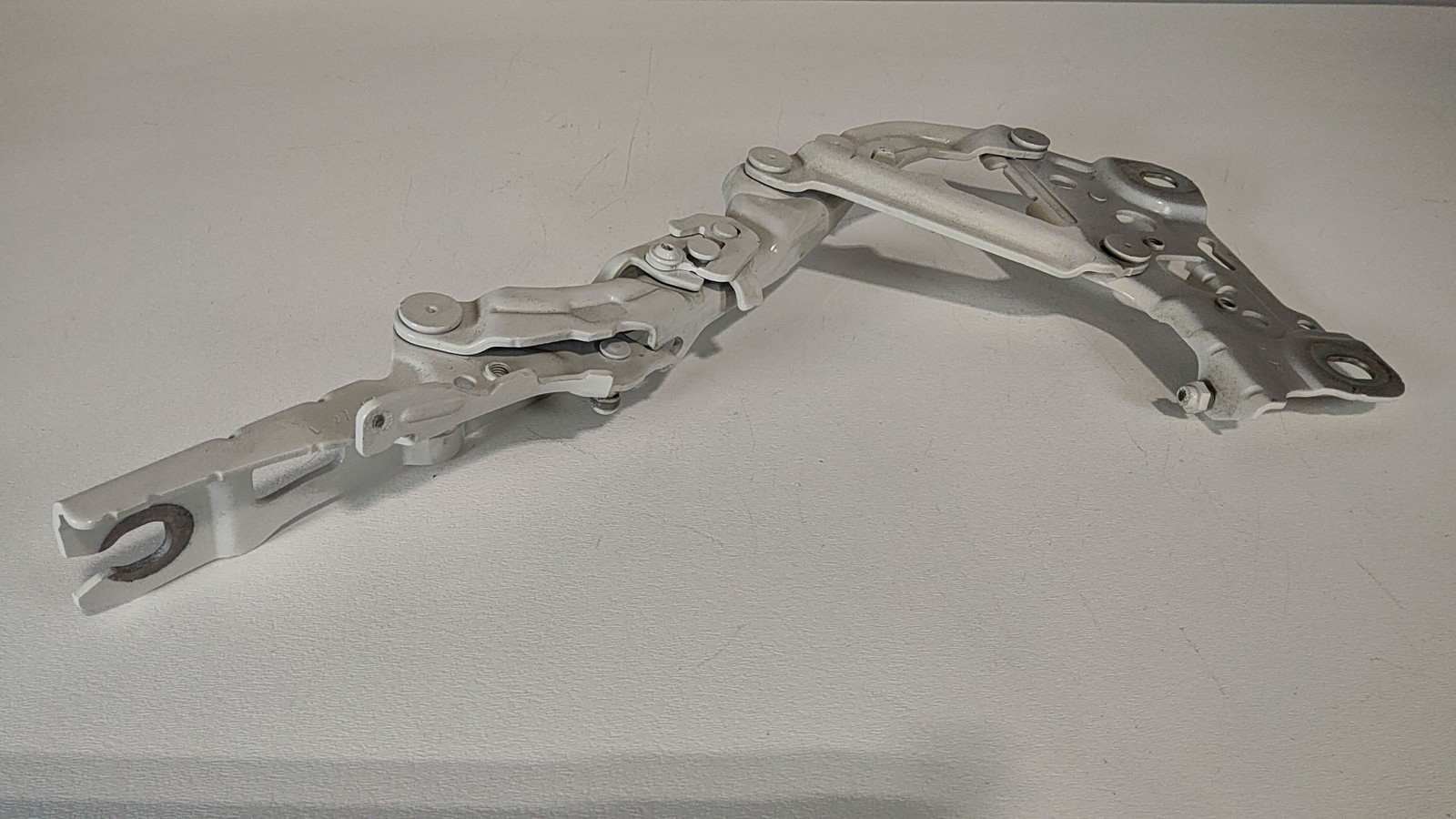 2016-2024 BMW 740i Left Side Hood Hinge OEM 41007427051